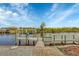 Private boat dock with lift provides waterfront access for boating and fishing at 9460 Migue Cir, Port Charlotte, FL 33981