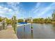 Private boat dock with lift for easy waterfront access at 9460 Migue Cir, Port Charlotte, FL 33981