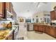 Open concept kitchen, stainless appliances and natural light with views of backyard at 9460 Migue Cir, Port Charlotte, FL 33981