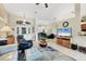 Bright and airy living room with open floor plan, stylish furniture, and a grand piano at 9460 Migue Cir, Port Charlotte, FL 33981