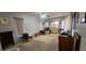 Bedroom with carpet flooring and plenty of natural light at 95 Mark Twain Ln, Rotonda West, FL 33947