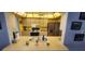 Cozy kitchen with stainless steel refrigerator and ample counter space at 95 Mark Twain Ln, Rotonda West, FL 33947