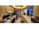 Functional kitchen layout featuring stainless steel appliances and plenty of counter space at 95 Mark Twain Ln, Rotonda West, FL 33947