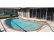 Sparkling screened pool area perfect for relaxation and entertainment at 95 Mark Twain Ln, Rotonda West, FL 33947