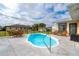Inviting pool area featuring outdoor seating and a well-maintained pool, perfect for relaxation and entertaining guests at 10075 Bentley Ave, Englewood, FL 34224