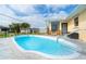 Inviting pool and patio area with comfortable seating, ideal for outdoor entertaining and enjoying the Florida weather at 10075 Bentley Ave, Englewood, FL 34224