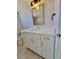 Bathroom featuring a vanity with a decorative mirror and modern finishes at 1247 Price Nw Cir, Port Charlotte, FL 33948