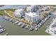 Aerial view of waterfront condos, with direct access to boat docks and community pool at 13313 Gasparilla Rd # 404, Placida, FL 33946