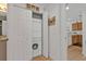 Convenient laundry closet featuring stacked washer and dryer in a bright, white space at 13313 Gasparilla Rd # 404, Placida, FL 33946