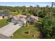 Aerial view of property showing pristine landscaping and neighborhood at 1332 Hedgewood Cir, North Port, FL 34288