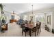 Open-concept living area showcasing a combined living and dining space at 1332 Hedgewood Cir, North Port, FL 34288