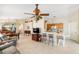 Spacious living area with bar seating, open to kitchen and dining area, perfect for entertaining at 1332 Hedgewood Cir, North Port, FL 34288