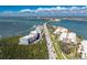 Aerial view of waterfront condo complex with stunning water views at 1410 Beach Rd # 201, Englewood, FL 34223