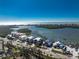 A row of charming waterfront condos offers direct access to the water, ideal for boating and enjoying coastal living at 1410 Beach Rd # 201, Englewood, FL 34223