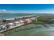 Stunning aerial view of waterfront condo community with boat docks along the canal at 1410 Beach Rd # 201, Englewood, FL 34223