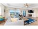 Bright living room with comfortable seating and ocean views at 1410 Beach Rd # 201, Englewood, FL 34223
