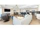 Bright open-concept living area with tile flooring at 1410 Beach Rd # 201, Englewood, FL 34223