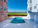 Community pool in a waterfront condo setting, perfect for relaxation and enjoyment at 1410 Beach Rd # 201, Englewood, FL 34223
