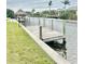 View of the dock on a waterfront property at 14261 Joggins Ave, Port Charlotte, FL 33981