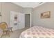 Bedroom featuring ceiling fan and closet with mirrored doors at 14298 Reserve Ct, Port Charlotte, FL 33953