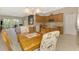 Open floor plan with dining area and kitchen at 14298 Reserve Ct, Port Charlotte, FL 33953