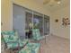 Enclosed lanai featuring seating and views of the exterior at 14298 Reserve Ct, Port Charlotte, FL 33953