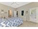 Large bedroom offering a private bathroom and views of the backyard at 14298 Reserve Ct, Port Charlotte, FL 33953