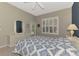 Spacious bedroom features plush carpeting and a private outdoor entrance at 14298 Reserve Ct, Port Charlotte, FL 33953
