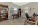 Inviting home office features wood floors, natural light, and plenty of storage at 14298 Reserve Ct, Port Charlotte, FL 33953