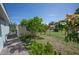 Spacious backyard featuring a shed and chain-link fencing offers ample outdoor space at 14382 Lillian Cir, Port Charlotte, FL 33981