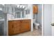 Bathroom featuring a vanity with updated fixtures, and a tiled floor at 14382 Lillian Cir, Port Charlotte, FL 33981