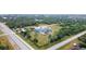 Single Gathering home nestled on spacious lot with mature trees and landscaping at 14382 Lillian Cir, Port Charlotte, FL 33981