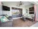 Inviting covered patio featuring wicker furniture and a view of the pool at 14382 Lillian Cir, Port Charlotte, FL 33981