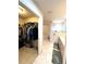 En suite bath with tub, walk-in shower and walk-in closet access at 14399 Morristown Ave, Port Charlotte, FL 33981