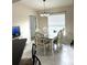 Dining room with chandelier and room for six chairs at 14399 Morristown Ave, Port Charlotte, FL 33981