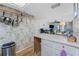 Bright kitchen with white countertops opening to the living area at 1461 Aqui Esta Dr # B3, Punta Gorda, FL 33950