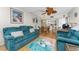 Comfortable living room with view into dining area and kitchen at 1461 Aqui Esta Dr # B3, Punta Gorda, FL 33950