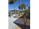 Waterfront property featuring a boat dock, canal access, and walkway at 14970 Appleton Blvd, Port Charlotte, FL 33981