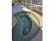 Outdoor hot tub with tile surround in a screened-in enclosure at 14970 Appleton Blvd, Port Charlotte, FL 33981