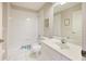 Clean, well-maintained bathroom with white fixtures and a tiled shower-tub combo at 150 N Oxford Dr, Englewood, FL 34223