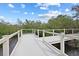 Private dock allows access to the water and views of surrounding landscape at 150 N Oxford Dr, Englewood, FL 34223