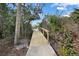 Exterior view of a backyard walking path at 150 N Oxford Dr, Englewood, FL 34223