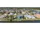 Waterfront homes boast backyard pools and docks with direct access to a scenic canal at 15652 Ruston Cir, Port Charlotte, FL 33981