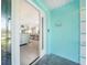Inviting entryway with bright blue accent wall and decorative tile flooring at 15652 Ruston Cir, Port Charlotte, FL 33981