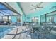 Stylish outdoor space with canal views, perfect for dining or relaxing by the pool at 15652 Ruston Cir, Port Charlotte, FL 33981