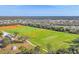 Expansive green athletic fields with surrounding community, ideal for outdoor activities at 16273 Coconut Palm Dr, Port Charlotte, FL 33953