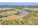 Aerial view of pristine baseball fields offering ample space for recreational sports at 16273 Coconut Palm Dr, Port Charlotte, FL 33953