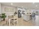Bright dining area adjacent to the kitchen, perfect for casual meals and entertaining at 16273 Coconut Palm Dr, Port Charlotte, FL 33953