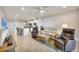 Open-concept living room featuring modern finishes and abundant natural light at 16273 Coconut Palm Dr, Port Charlotte, FL 33953
