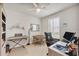 Bright office space with a large window, plantation shutters, and neutral paint, perfect for working from home at 16273 Coconut Palm Dr, Port Charlotte, FL 33953